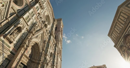 The facade of the Basilica of Santa Maria del Fiore in Florence, Italy. Cityscape of an ancient city with a cathedral with historical architecture in the tourist center of Europe. High quality 4k  photo