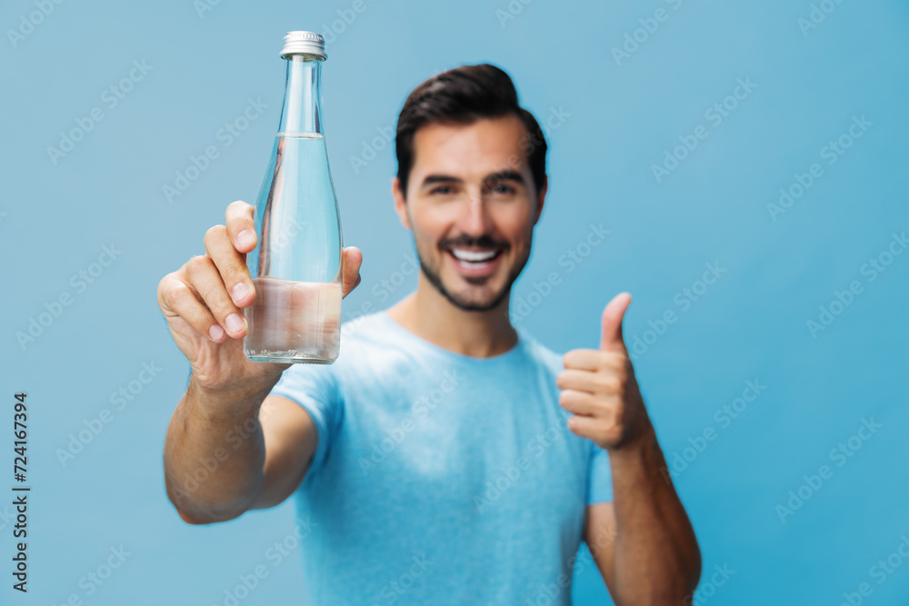 Man water healthy attractive drink studio lifestyle bottle sport portrait happy smile t-shirt Man water healthy attractive drink studio lifestyle bottle sport portrait happy smile t-shirt