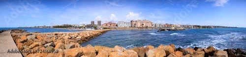 Photos Cityscape of Civitavecchia in Italy: skyline of promenade.