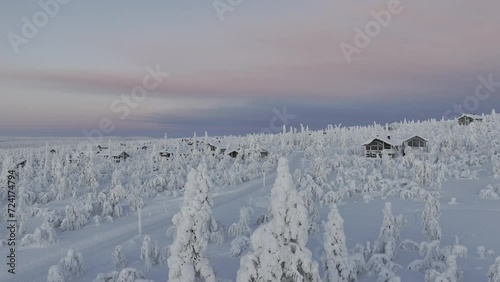 Sky view of a finnish cottage village in national park in Lapland photo
