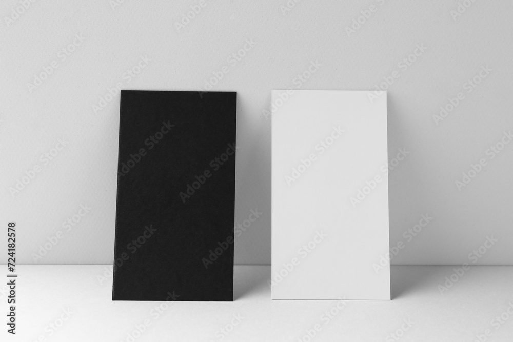 Blank business cards on white background. Mockup for design Blank business cards on white background. Mockup for design