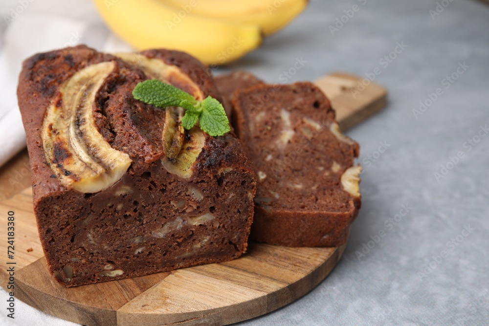 Delicious banana bread on grey table, closeup