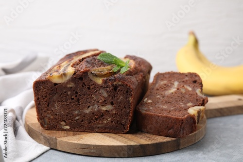 Delicious banana bread on grey table, closeup