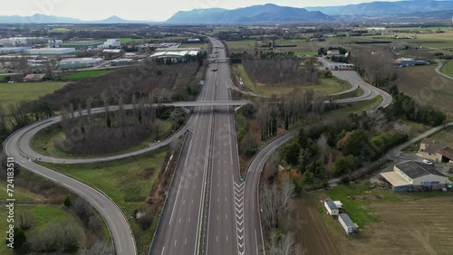 Loriol sur Drome, France - January 27, 2024: Empty A7 Sunny Motorway in France. Farmers' Protest, Tires, Tractors, Agricultural Machines on the Highway, completely blocking road traffic. photo
