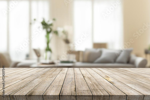Wooden table on the background of the interior of the room