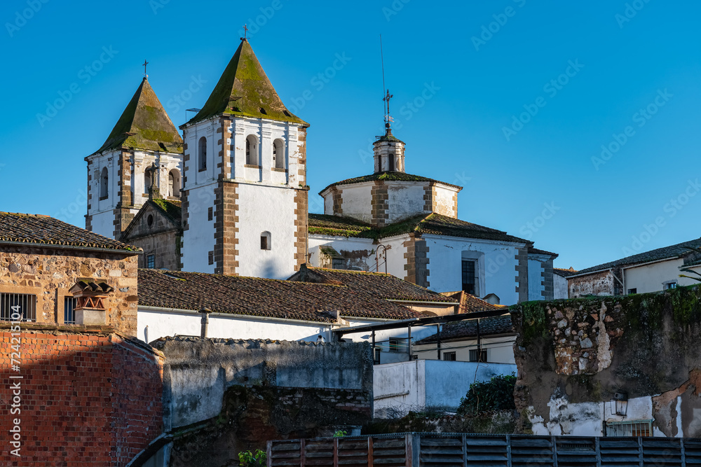 Cityscape of the city of Caceres with its white-fronted church in Extremadura, Spain.