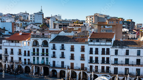 Facades of the picturesque houses in the main square of Caceres, Extremadura. photo