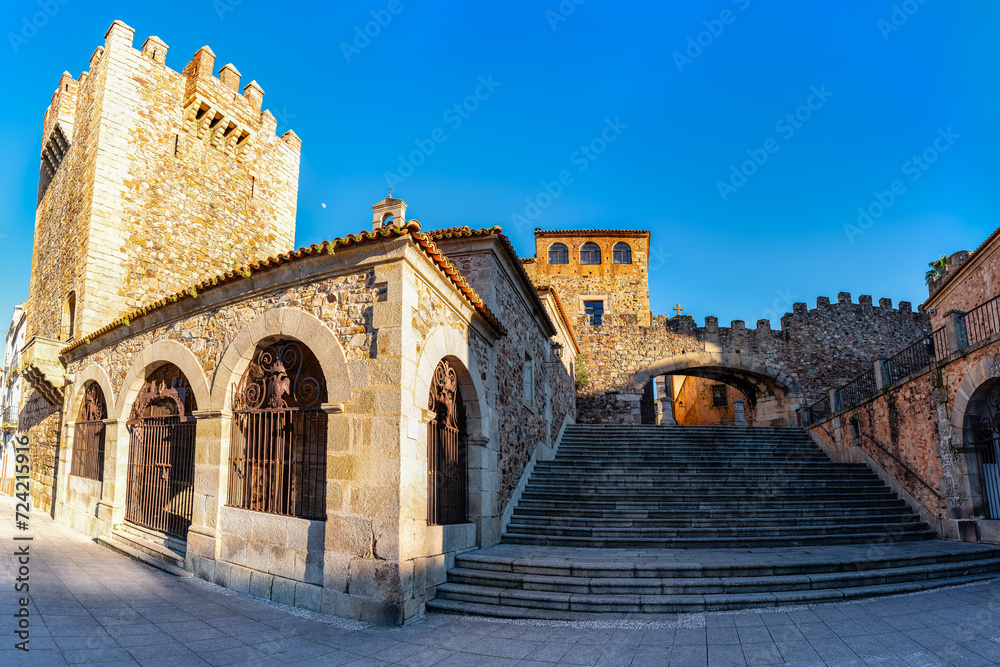 A group of medieval buildings next to the main square of Caceres, a World Heritage Site