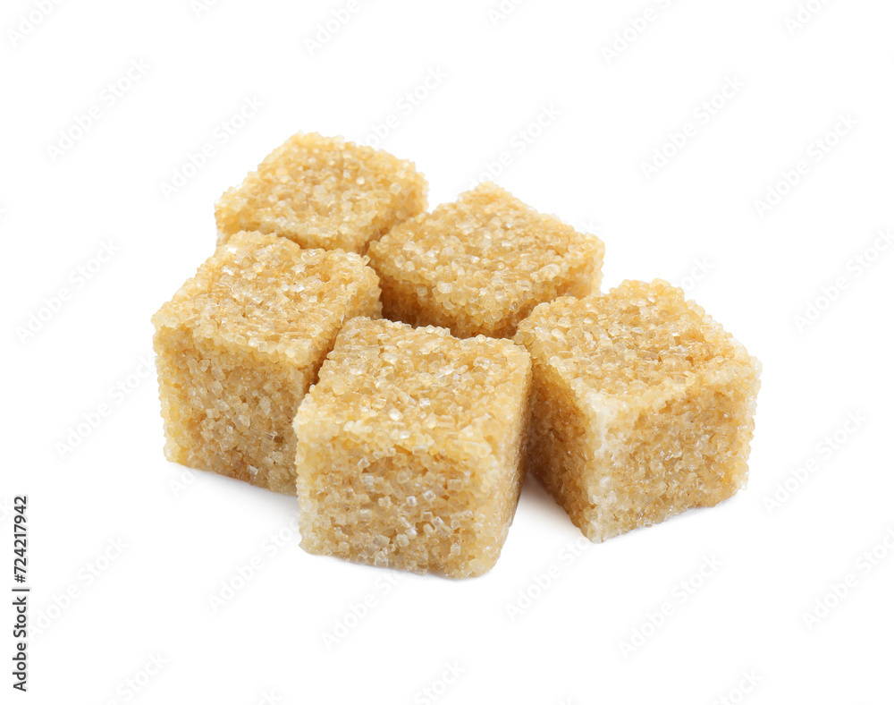Many brown sugar cubes isolated on white Many brown sugar cubes isolated on white