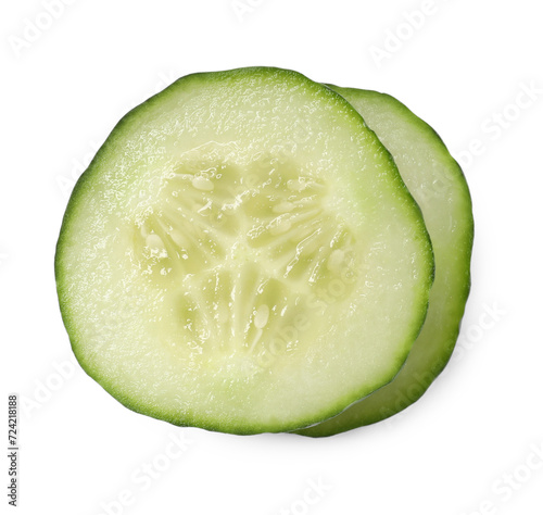 Slices of fresh cucumber isolated on white, top view