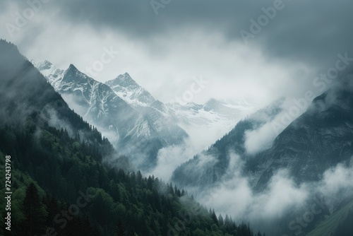 Breathtaking view of majestic snow-capped mountains with jagged peaks, contrasted against smooth cloudy skies. A serene and captivating alpine landscape