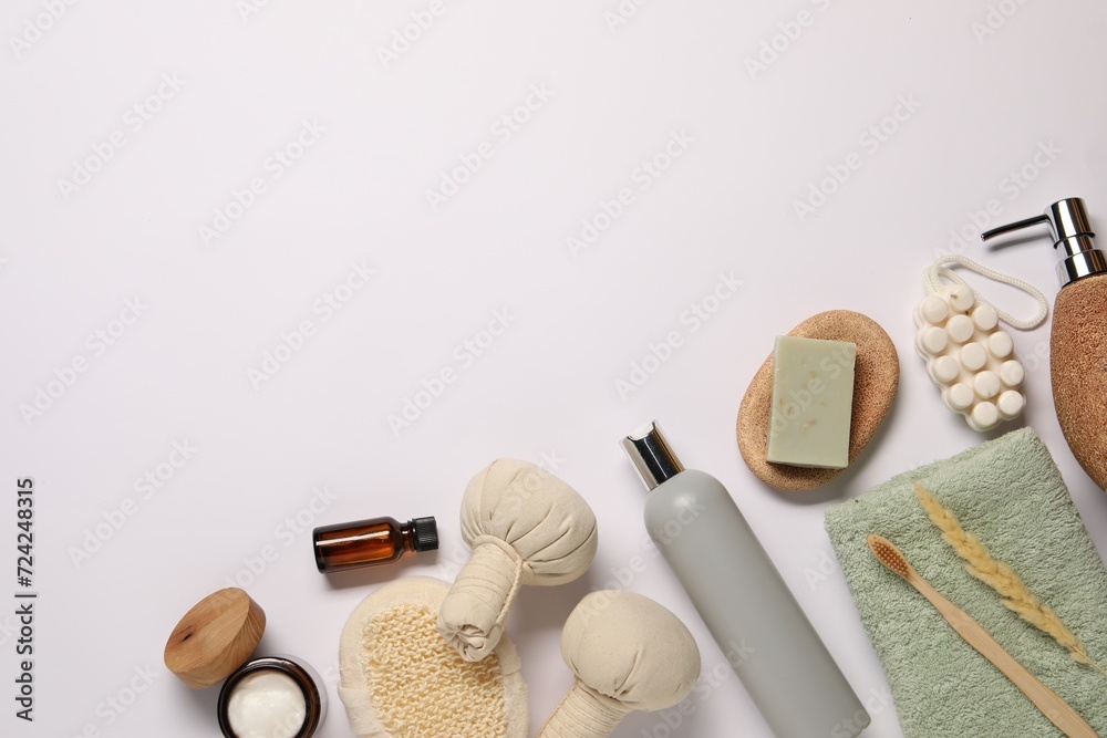 Bath accessories. Different personal care products and dry spikelet on white background, flat lay with space for text Bath accessories. Different personal care products and dry spikelet on white background, flat lay with space for text