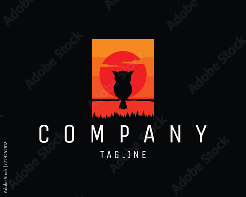 owl. isolated on a black background seen from behind with a view of a large owl and moon. best for logo, badge, emblem, icon, sticker design. available in eps 10 photo