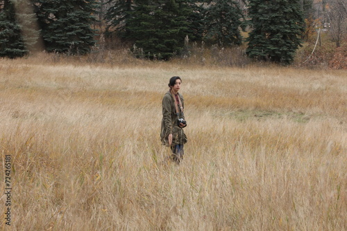 woman walking in the meadows