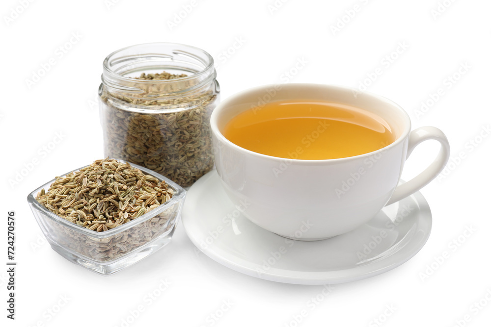 Aromatic fennel tea in cup and seeds isolated on white Aromatic fennel tea in cup and seeds isolated on white