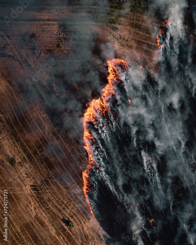 aerial view of burning field with crops in europe