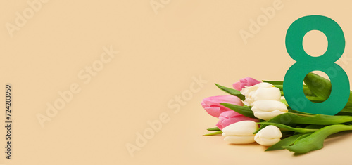 Paper figure 8 and beautiful tulips on beige background with space for text. International Women's Day