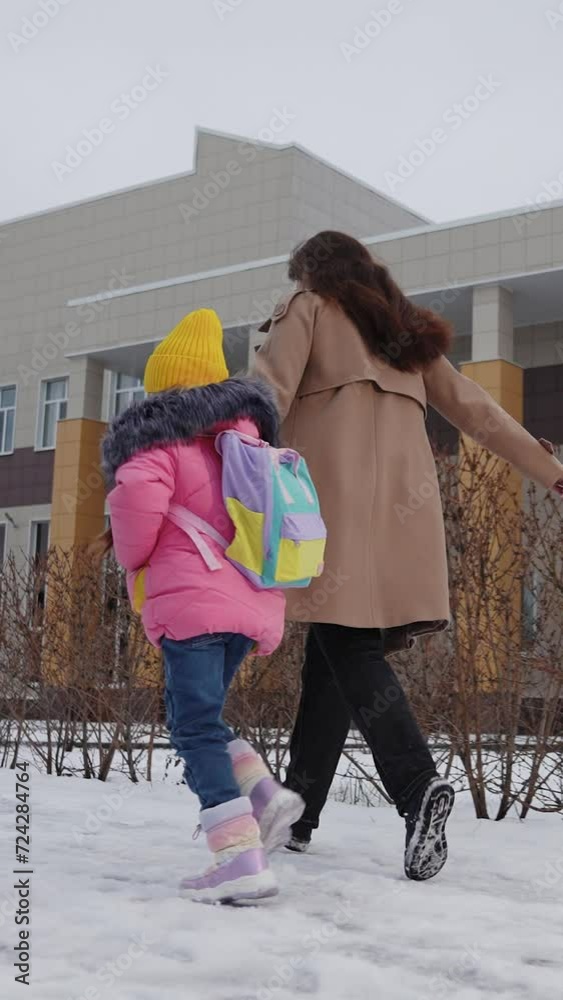 child schoolboy runs holding his mother hand school, child girl kid