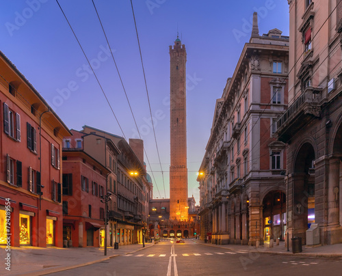 Leaning towers of Garisenda and Asinelli in Bologna at dawn. photo