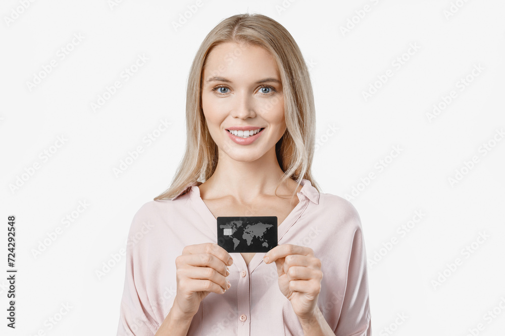 Close up portrait of happy young girl showing credit card isolated over white background. Concept of online shopping remote purchases, e-baking e-commerce loan Close up portrait of happy young girl showing credit card isolated over white background. Concept of online shopping remote purchases, e-baking e-commerce loan