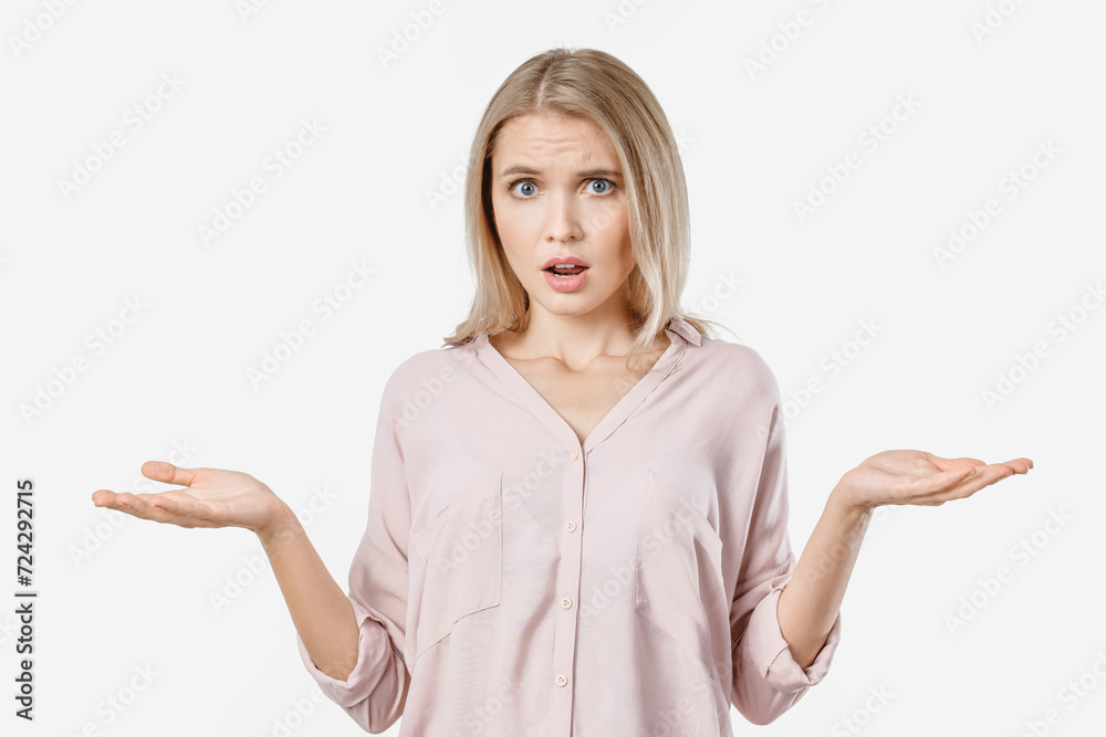 Portrait of angry young woman screaming isolated over white background. Negative emotion of embracement, shock, disgust. Offended female, disappointed Portrait of angry young woman screaming isolated over white background. Negative emotion of embracement, shock, disgust. Offended female, disappointed