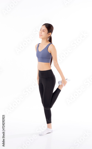 Portrait beautiful young asian woman stretching leg for exercise yoga and relax isolated on white background, female doing cardio and workout training for muscle strong, sport and warm up concept.