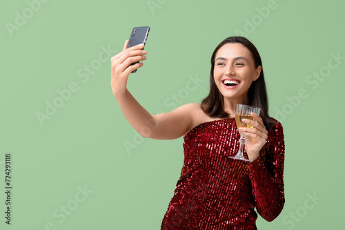 Happy young woman in a red ...