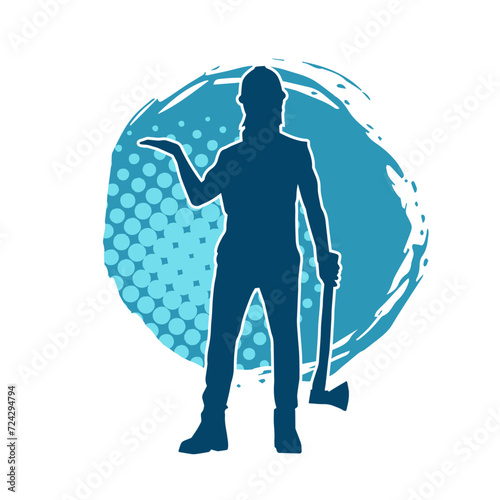 Silhouette of a worker in action pose using his axe tool.