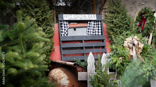 Red vintage truck with hot cocoa sign in the truck bed