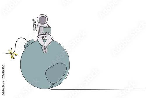 Single continuous line drawing young astronaut sitting on large bomb with a burning fuse holding laptop raise one hand. Reckless expeditions jeopardize research. One line design vector illustration