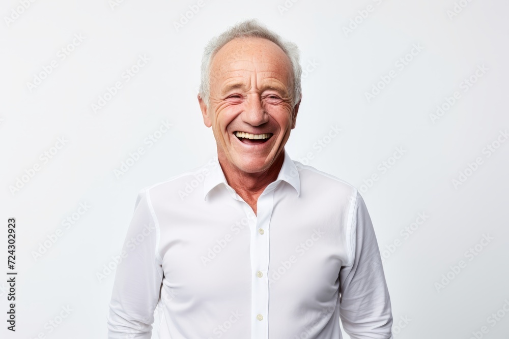 Portrait of a happy senior man isolated on a white background. Portrait of a happy senior man isolated on a white background.