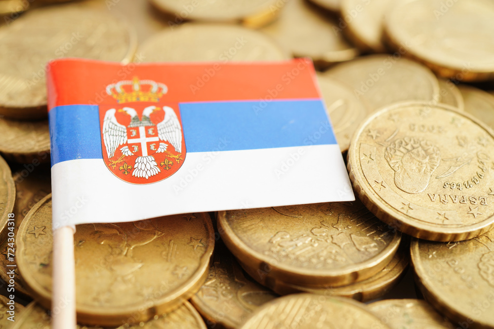 Serbia flag on coin and banknote money, finance trading investment business currency concept.