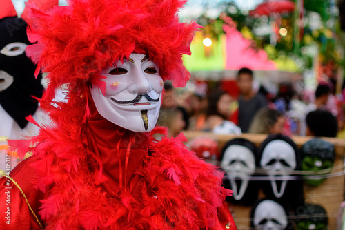 People wearing venice carnival style costumes during parties