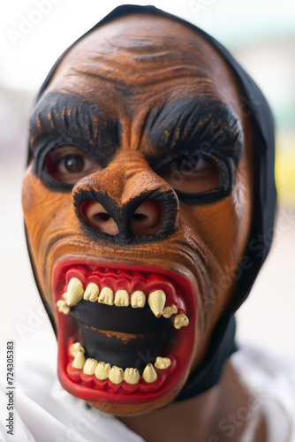 Unidentified person is seen wearing a horror mask in the Acupe district in the city of Santo Amaro, Bahia.