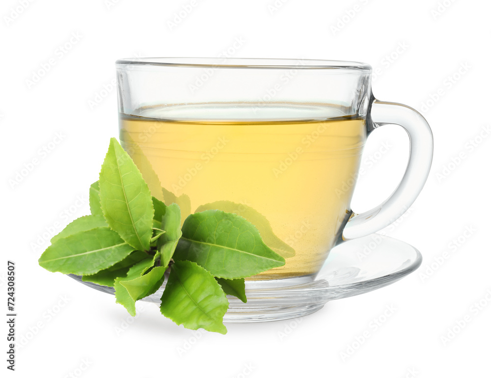 Green tea in glass cup and green leaves isolated on white Green tea in glass cup and green leaves isolated on white