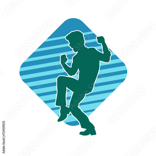 Silhouette of a male dancer in performing pose. Silhouette of a dancing man.