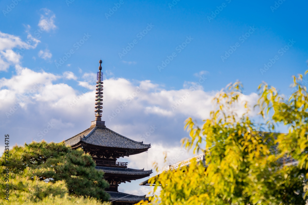 Yasaka Pagoda view and Hokan-ji Temple from Yasaka Dori street in Kyoto, Japan. Popular touristic street leading to Kyomizu Dera, Ninenzaka and Sennenzaka, In the evening, the sunset. 