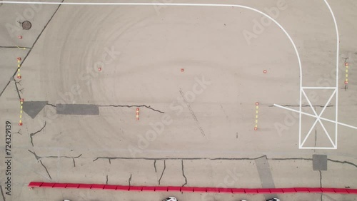 Bird Eye View of Motorcycle Slalom  Through Cones in Driver Training Area photo