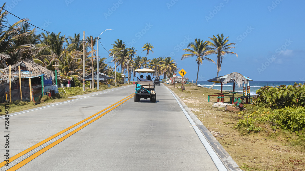 driving a Golf Cart around this magic island on San Andres Island, Colombia,