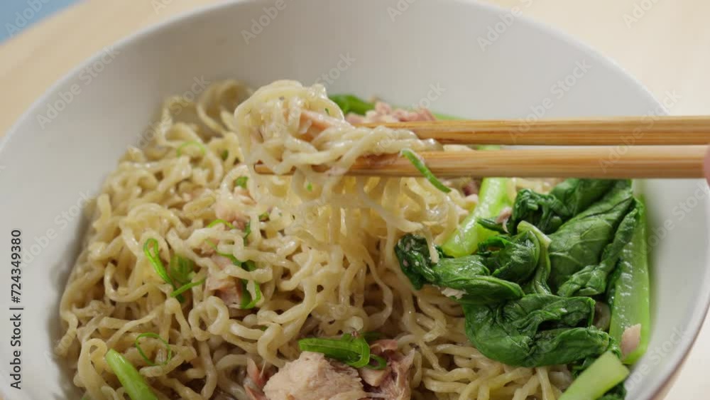 Bakmi wheat based noodles derived from Chinese cooking tradition, close up Bakmi wheat based noodles derived from Chinese cooking tradition, close up