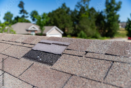 Roofing shingle damaged in storm