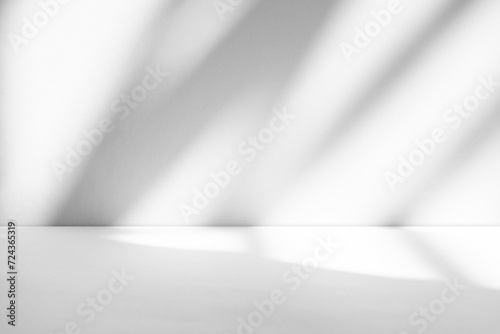 Wall interior background, studio and backdrops show products.with shadow from window color white and grey. background for text insertion and presentation product	
