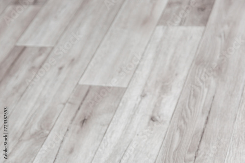 Gray wooden board pattern on linoleum surface