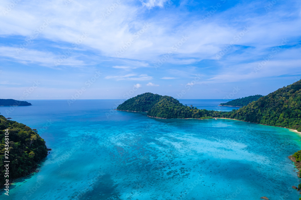 Aerial view of  Island in the Andaman Sea. natural blue sea Tropical seas of Thailand The beautiful scenery of the island is very impressive.