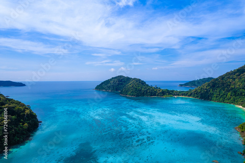 Aerial view of  Island in the Andaman Sea. natural blue sea Tropical seas of Thailand The beautiful scenery of the island is very impressive. © Photo Sesaon