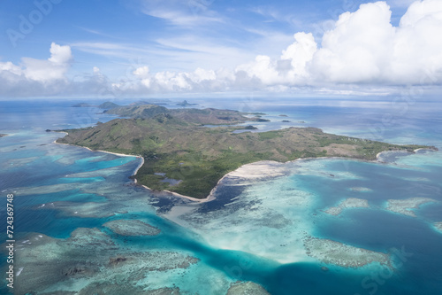 Aerial view above tropical coral reef on Island in Fiji in the Pacific Ocean photo
