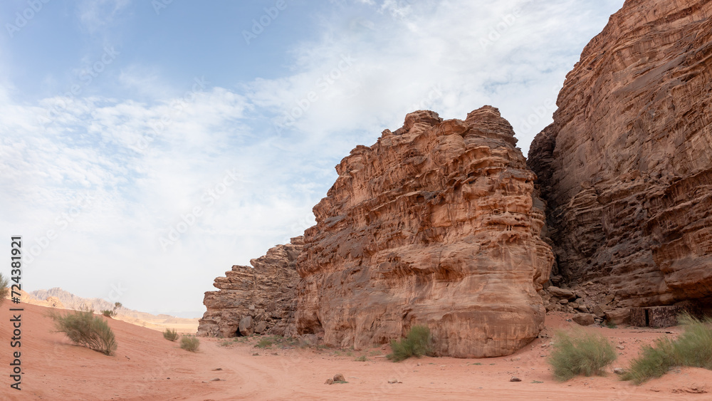 Unforgettable high mountains in endless sandy red desert of the Wadi Rum near Amman in Jordan Unforgettable high mountains in endless sandy red desert of the Wadi Rum near Amman in Jordan