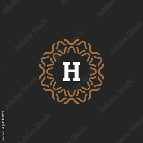 Initial letter H ornamental border circle frame logo