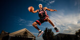 basketball player with ball, basketball player in action, person jumping, person jumping in the air