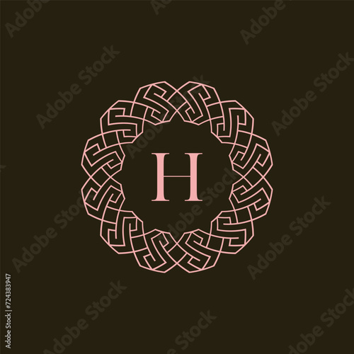 Initial letter H ornamental border circle frame logo